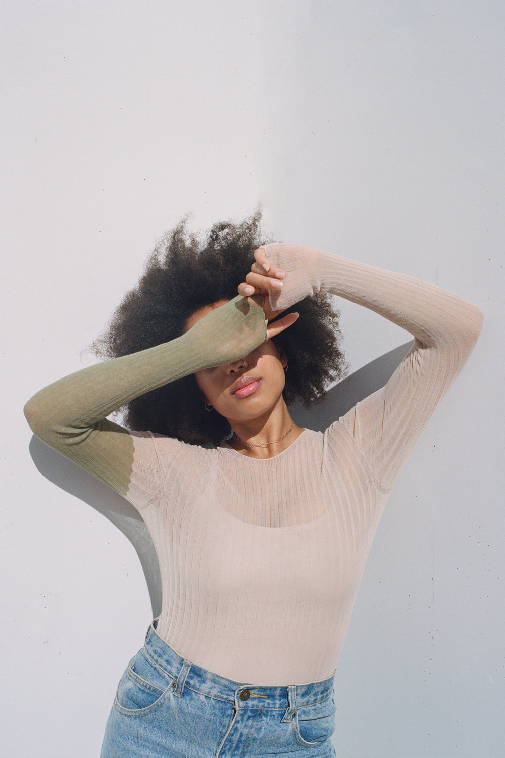 Woman standing wearing a blush and khaki coloured Standard Issue Colour Block Cotton Tulle Top.